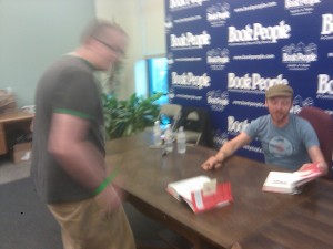 Simon Pegg signs my copy of Nerd Do Well.